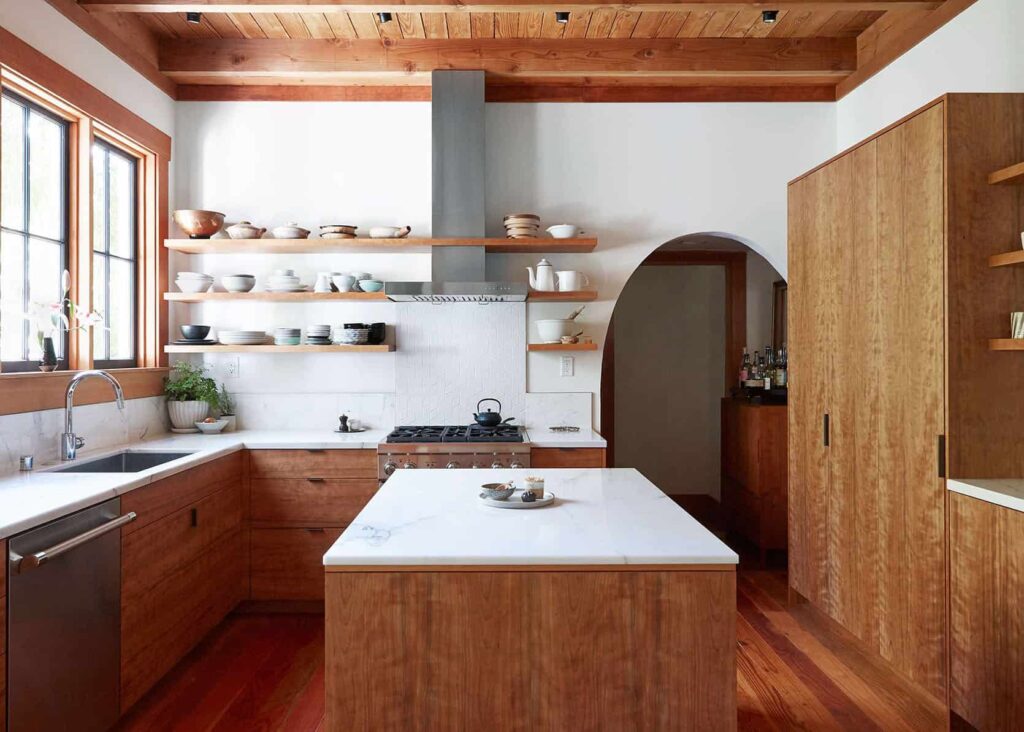 Wood flooring and wood cabinets designed by Emily Henderson.