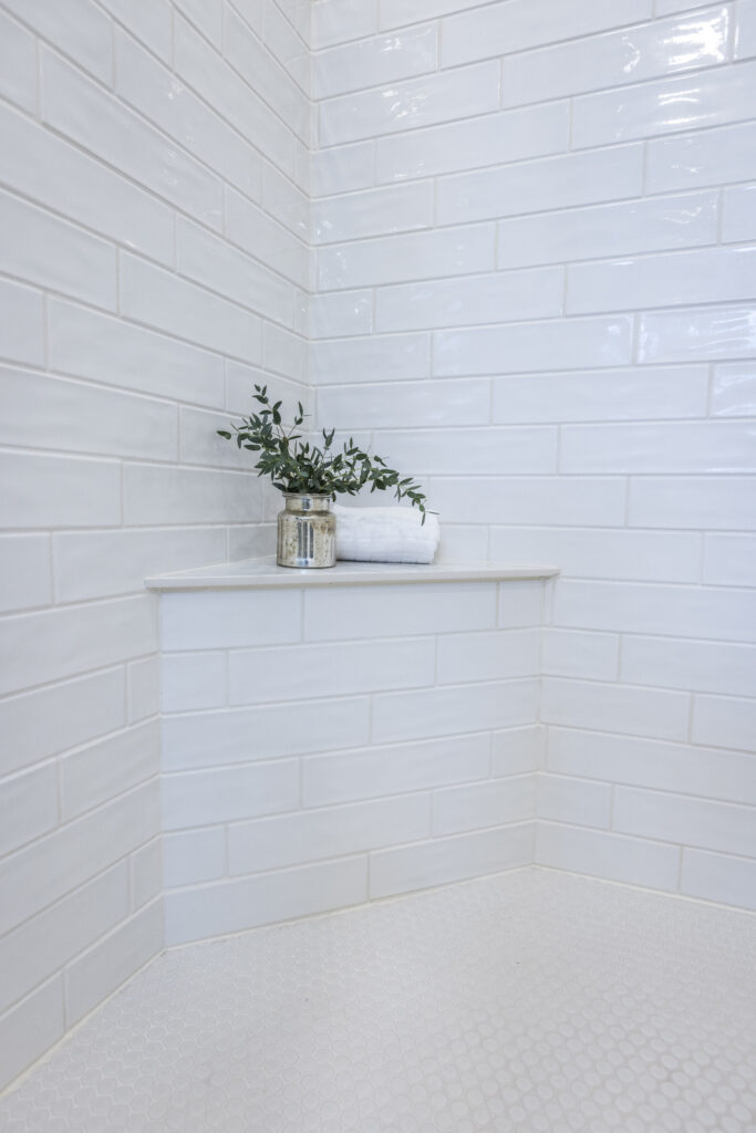 White tile bathroom shower